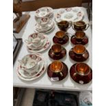 AN ASSORTMENT OF CERAMIC WARE TO INCLUDE A CARLTON WARE COFFEE SERVICE SET AND FLORAL TRIOS ETC