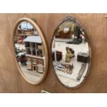 A COPPER FRAMED BEVELED EDGE MIRROR AND A FURTHER GILT FRAMED BEVELED EDGE MIRROR
