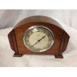 AN EIGHT DAY MANTLE CLOCK
