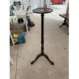 A 19TH CENTURY STYLE MAHOGANY JARDINIER STAND ON TAPERED COLUMN AND TRIPOD BASE