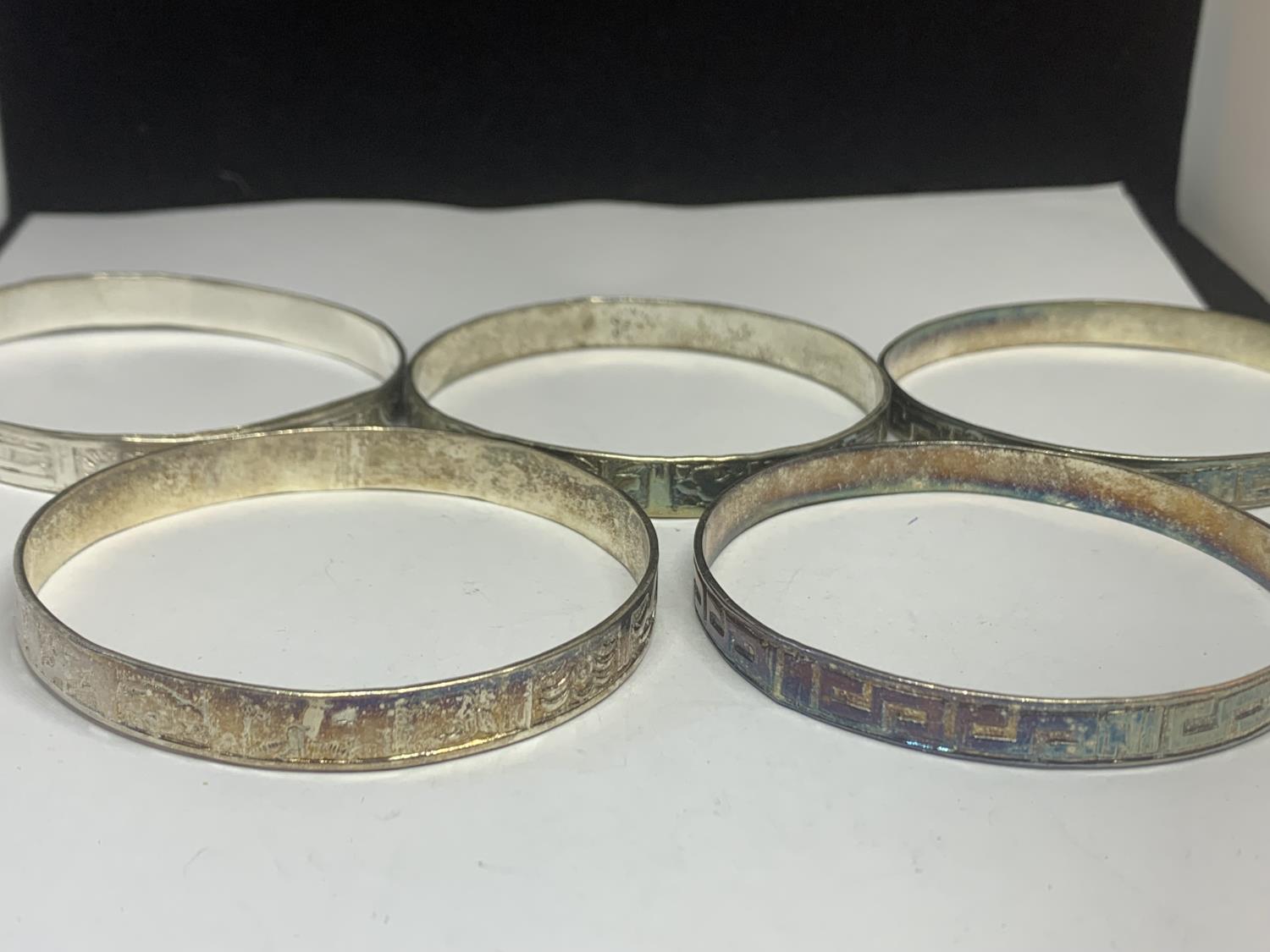 FIVE SILVER BANGLES WITH VARIOUS DESIGNS - Image 2 of 2