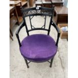 AN ARTS & CRAFTS BLACK PAINTED ELBOW CHAIR A/F