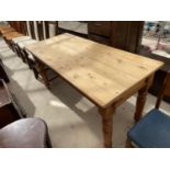 A MODERN PINE KITCHEN TABLE, 60X27", ON TURNED LEGS