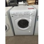 A WHITE HOTPOINT WASHER DRYER BELIEVED IN WORKING ORDER BUT NO WARRANTY