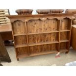 A MODERN PINE OPEN BOOKCASE/DRESSER RACK, 62" WIDE