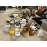 A LARGE ASSORTMENT OF CERAMIC WARE TO INCLUDE BISCUIT BARRELS, TEAPOTS AND LAMPS ETC