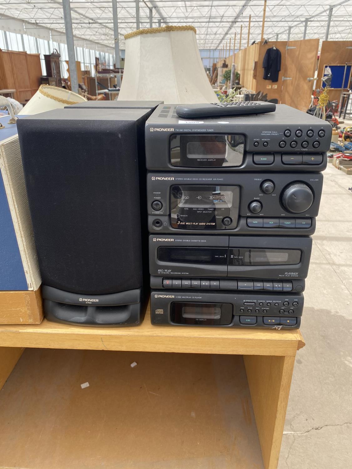 A PIONEER STEREO SYSTEM WITH TWO SPEAKERS