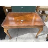 A WALNUT COFFEE TABLE ON CABRIOLE LEGS TOGETHER WITH A CARD TABLE