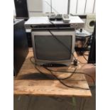A BUSH TELEVISION AND A PACIFIC DVD PLAYER