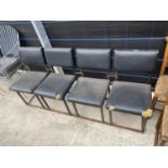 A SET OF FOUR JOINED CHAIRS ON BOX METAL FRAME