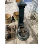 A VINTAGE CAST IRON WATER PUMP