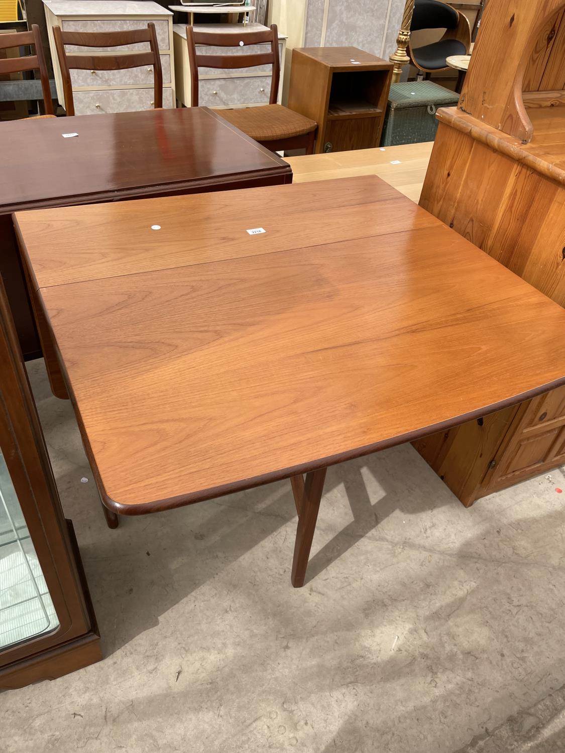 A RETRO TEAK DROP-LEAF DINING TABLE, 36X54" OPENED