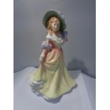 A ROYAL DOULTON FIGURINE KATIE