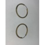 A PAIR OF 9 CARAT GOLD HOOP EARRINGS IN A PRESENTATION BOX