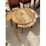 A RETRO TEAK SET OF FOUR TABLES (MAIN TABLE 24" DIAMETER) A/F