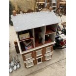 A VINATGE DOLLS HOUSE WITH AN ASSORTMENT OF DOLLS FURNITURE