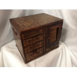 A MINATURE PARQUE WOODEN CHEST WITH DRAWERS 32CM X 26CM