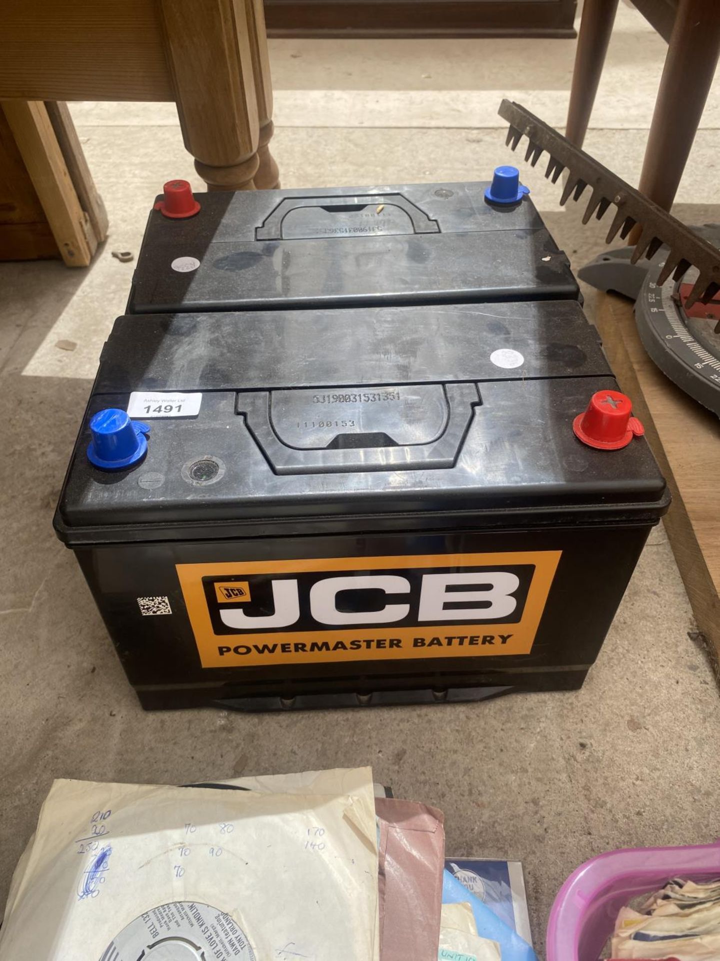 A PAIR OF JCB POWERMASTER CAR BATTERIES