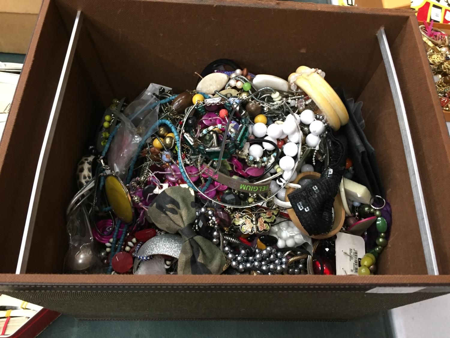 A LARGE BOX OF COSTUME JEWELLERY