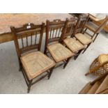 A SET OF FOUR EDWARDIAN BEDROOM CHAIRS WITH CANE SEATS