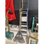 A FIVE RUNG TUBULAR METAL STEP LADDER AND A FURTHER THREE RUNG ALLUMINIUM STEP LADDER