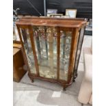 A SHINY WALNUT CHINA DISPLAY CABINET ON CABRIOLE LEGS, 40" WIDE