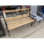 A REFURBISHED WOODEN SLATTED GARDEN BENCH WITH CAST BENCH ENDS