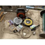 AN ASSORTMENT OF EXTENSION LEADS AND LIGHT BULBS ETC