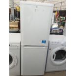 A WHITE BEKO UPRIGHT FRIDGE FREEZER BELIEVED IN WORKING ORDER BUT NO WARRANTY