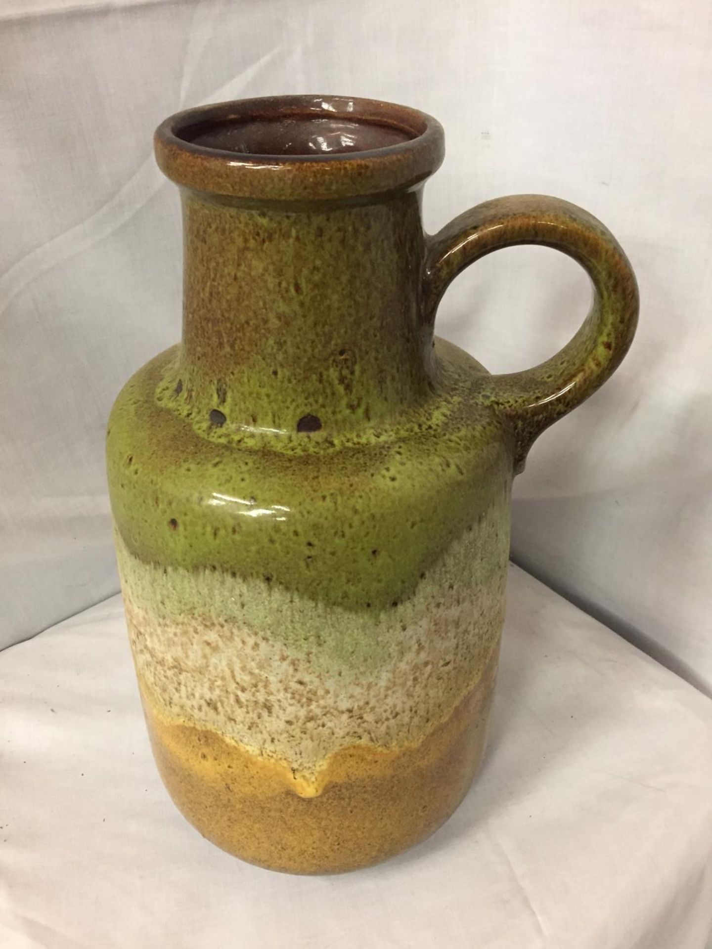 A LARGE WEST GERMAN POTTERY HANDLED VASE HEIGHT 39CM