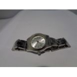 A LADIES WHITE METAL WRIST WATCH SEEN WORKING BUT NO WARRANTY