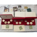 A SMALL BOX OF COINS TO INCLUDE THREE BOXED IOM SETS PLUS VARIOUS OTHERS .