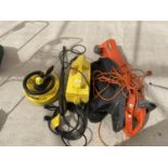 A KARCHER 411A PRESSURE WASHER AND A FLYMO LEAF BLOWER