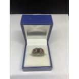 A SILVER AND THREE STONE RING WITH PRESENTATION BOX