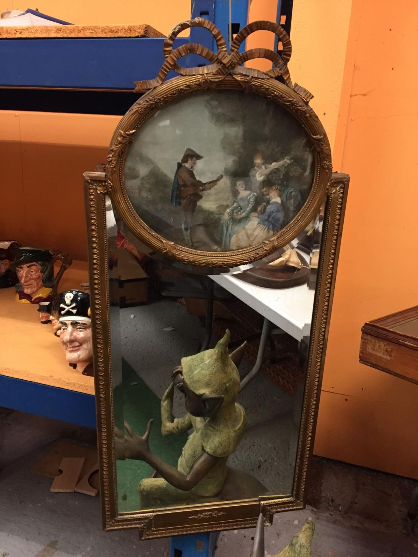 A GILT FRAMED MIRROR WITH AN INTEGRATED PICTURE HEIGHT 90CM