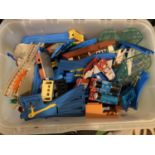 A BOX OF TOMY TRAIN TRACKS AND RELATED PIECES TO INCLUDE THOMAS THE TANK ENGINE AND FRIENDS TOYS