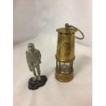 A BRASS MINATURE MINERS PROTECTION LAMP ECCLES AND A FIGURE OF A MINER