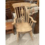 A VICTORIAN STYLE FARMHOUSE ROCKING CHAIR