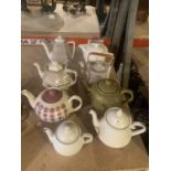 A SELECTION OF 6 TEA POTS AND 2 COFFEE POTS