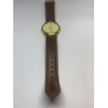 A GENTS SEKONDA WRIST WATCH WITH BROWN LEATHER STRAP SEEN WORKING BUT NO WARRANTY