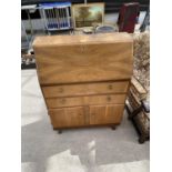 A SMALL WALNUT BUREAU, 29" WIDE