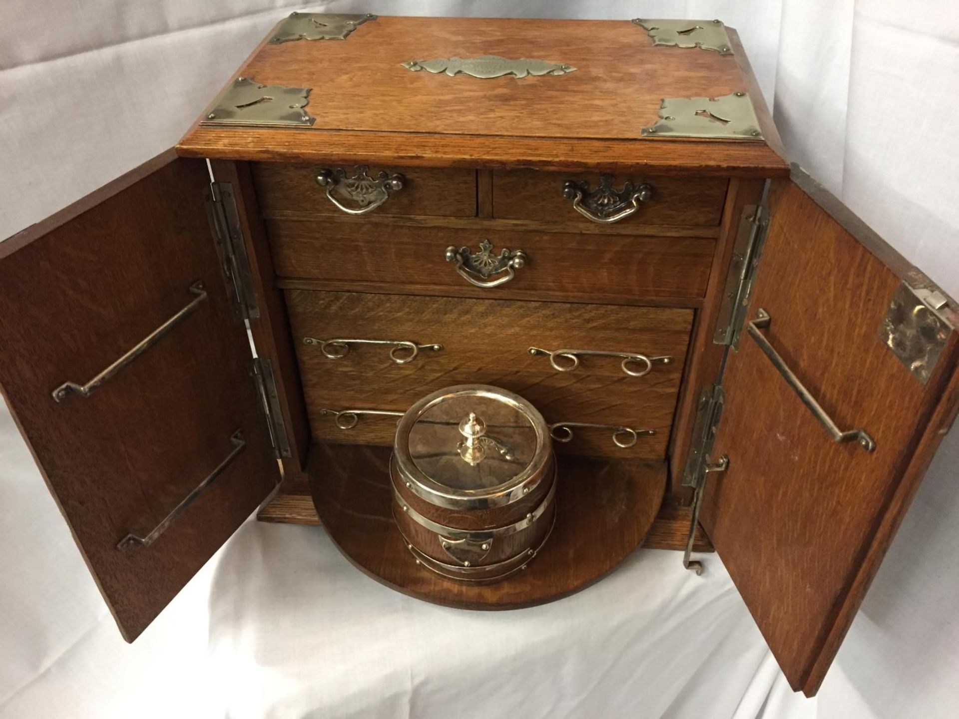 AN EDWARDIAN OAK SMOKING ROOM COMPENDIUM DATED 1921 HEIGHT 32CM - Image 2 of 4