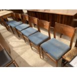 A SET OF SIX RETRO TEAK DINING CHAIRS