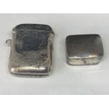 A HALMMARKED BIRMINGHAM SILVER VESTA CASE AND A SILVER PILL BOX