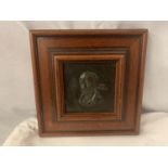 A FRAMED COPPER PLAQUE