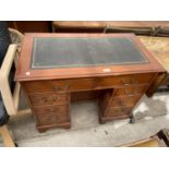 A MODERN YEW WOOD TWIN PEDESTAL DESK, ENCLOSING EIGHT DRAWERS, WITH INSET LEATHER TOP, 36X19.5"