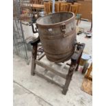 A LARGE VINTAGE BUTTER CHURN WITH STAND