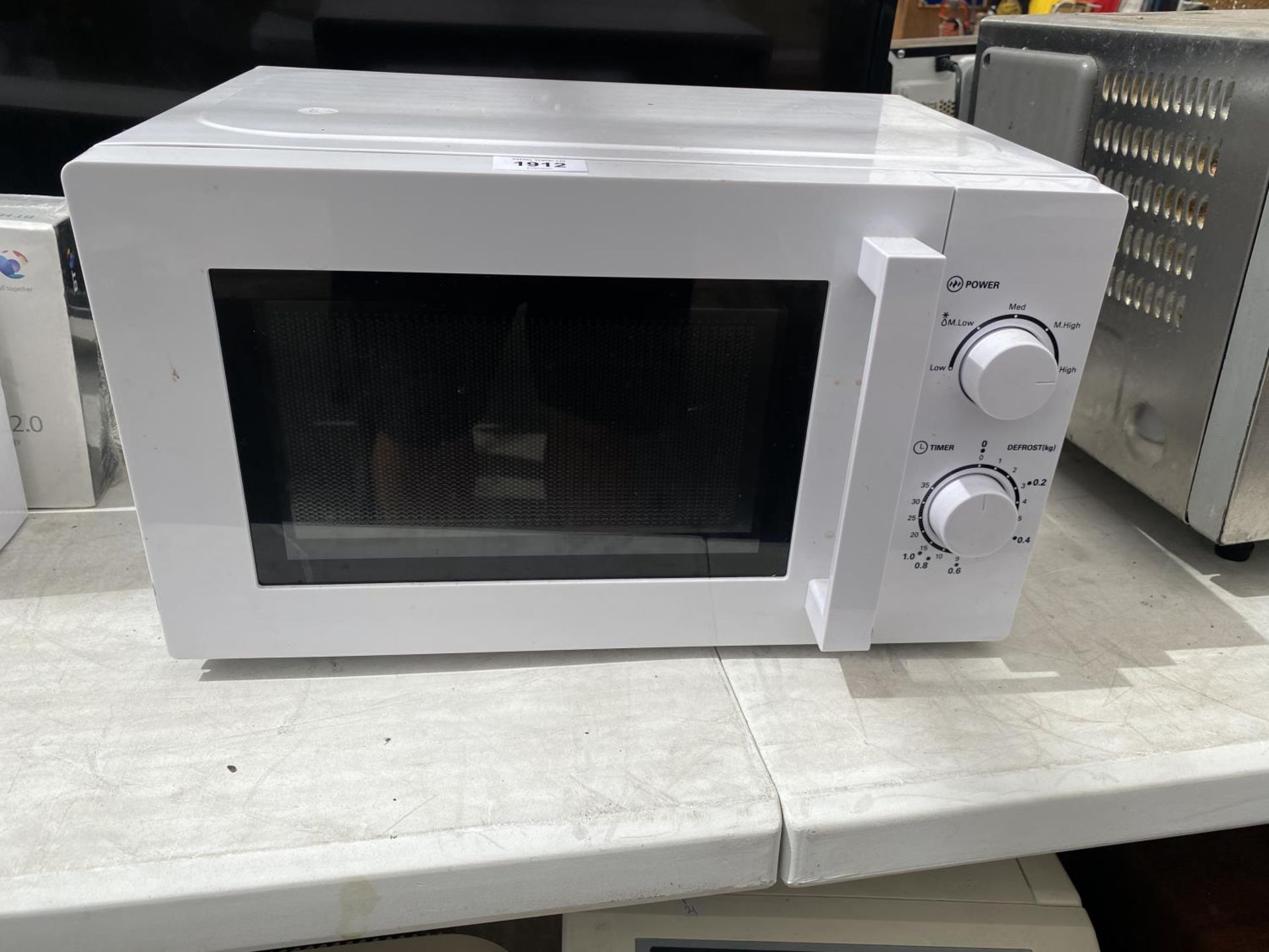 A WHITE MORRISONS MICROWAVE