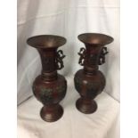 TWO DECORATIVE BRONZE URNS, ONE TOP NEEDS RE-AFFIXING, ONE MISSING HANDLE 38CM HIGH