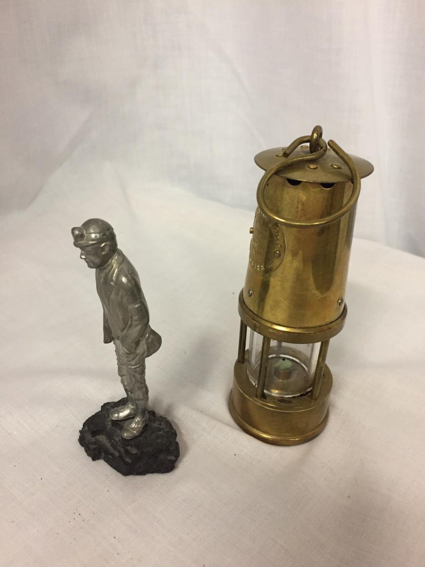 A BRASS MINATURE MINERS PROTECTION LAMP ECCLES AND A FIGURE OF A MINER - Image 2 of 3